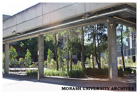 Courtyard in front of Monash University Museum of Art (MUMA), with level 2 walkway in foreground