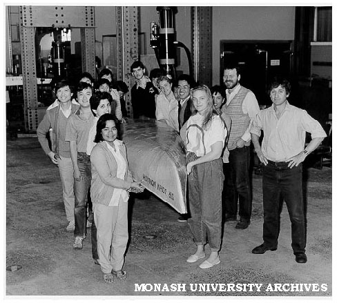 Students and staff with the 'Sir John Monash'. Dr Peter Darvall and Mr Rafael Grzebieta, and 4th Year Civil Engineering students, before the grand Concrete Canoe Race