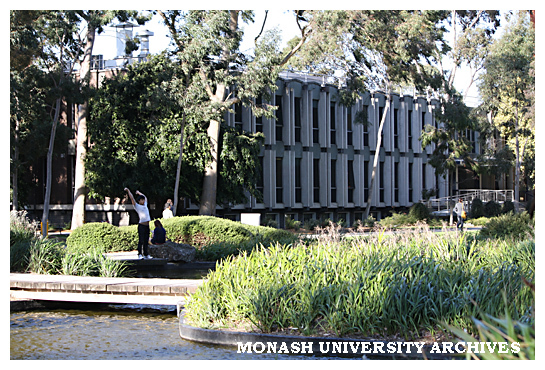 Administration building, Clayton campus, with pond in foreground