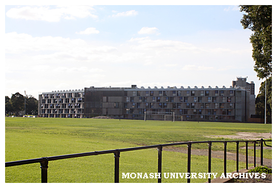 Briggs Hall with playing fields in foreground, Clayton campus