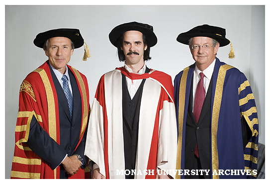Chancellor Dr Alan Finkel (left) with Nick Cave and Vice-Chancellor Professor Richard Larkins after award of honorary Doctor of Laws