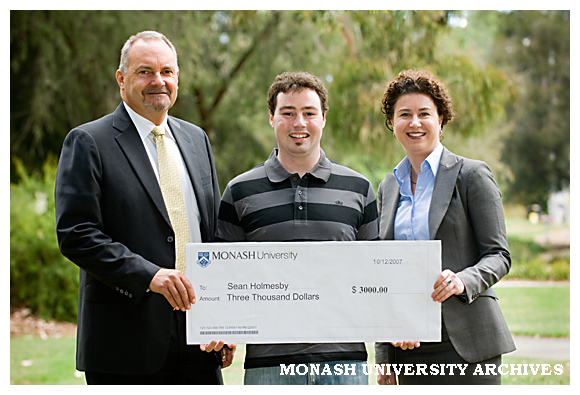 Pro Vice-Chancellor (Quality) Professor Graham Webb (left), Mr Sean Holmesby winner of the Monash Experience Questionnaire and Ms Robyn Harris, director of the Centre for Higher Education.