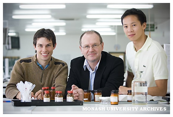 Senior Deputy Vice-Chancellor Professor Stephen Parker (centre) with pharmacy students Mr Adrian Weeks (left) and Mr Paul Bui