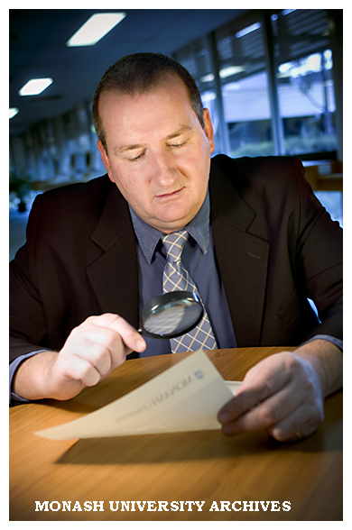 Client Services Manager Terry Hogan with new-look polymer transcripts