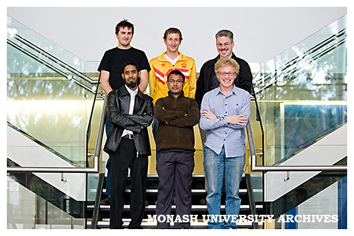 Monash e-Research Centre scholarship holders, Andrew Clarke (back, left), Nick Boustead, Chris Ellis, Jabed Bhuiyan (front), Aynul Kabir, Christopher Butler