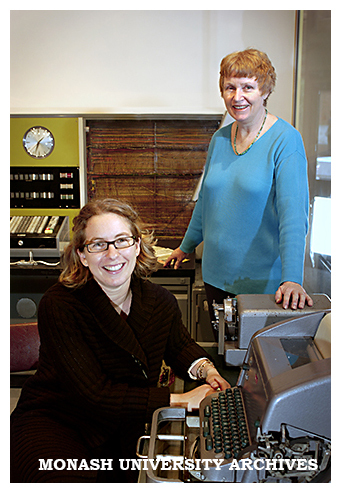 Historian Sarah Rood (seated) and Dr Judy Sheard in the Monash Museum of Computing History, with Ferranti Sirius computer in background