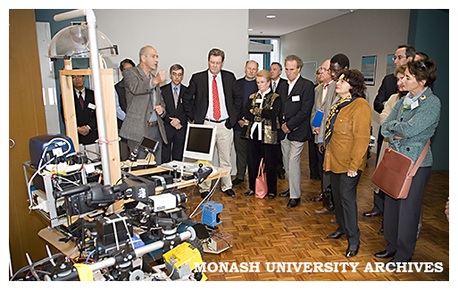 Foreign Minister Alexander Downer (centre) and a delegation of high commissioners and ambassadors with Professor Ray Jarvis (left)
