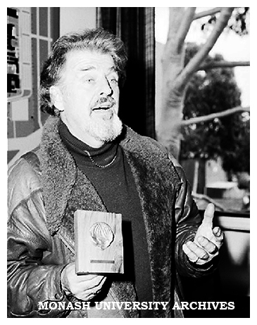 Sculptor Matcham Skipper with 25 year medal that he designed.