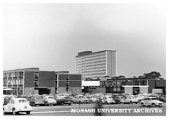 Looking east from the car park to Science buildings with Robert Menzies School of Humanities in background.