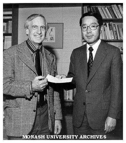 Dean of Arts Professor John Legge receiving donation for Japanese Studies Centre from Mr M. Inukai of Toyota Motor Company