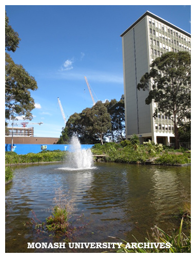 Pond with Alexander Theatre undergoing renovation (left) and Menzies Building (right), Clayton campus