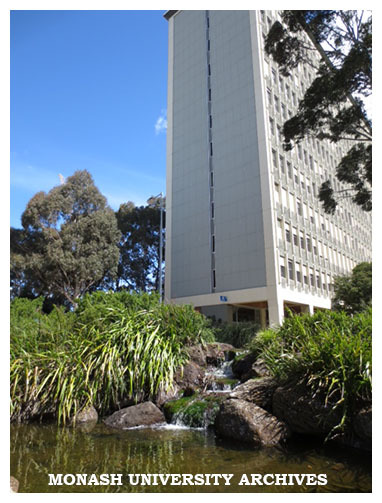 Menzies Building with pond in foreground, Clayton campus