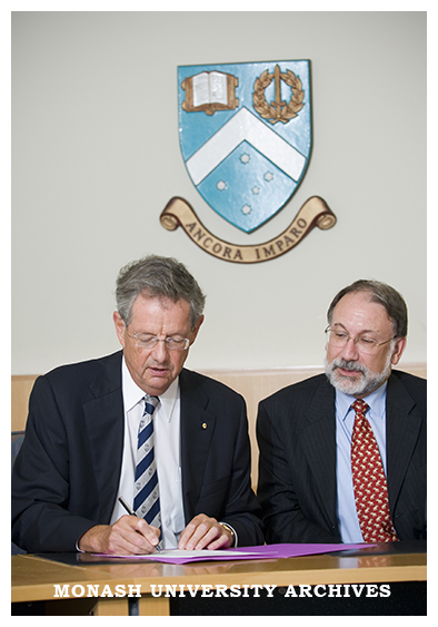 Vice-Chancellor Richard Larkins and Dean of Science Rob Norris signing the Talloires Declaration