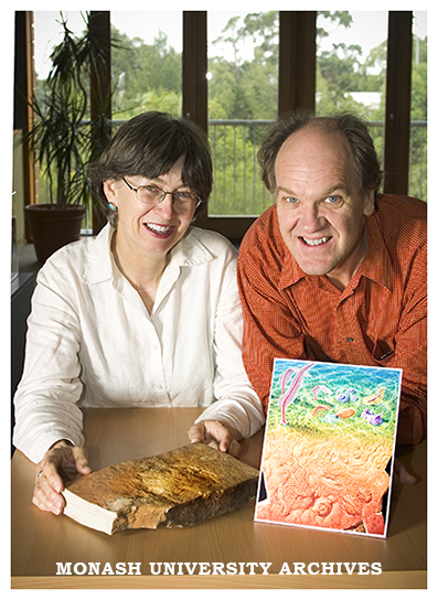 Monash Science Centre Director Professor Pat Vickers-Rich with artist Paul Trusler and his design for Australia Post stamp