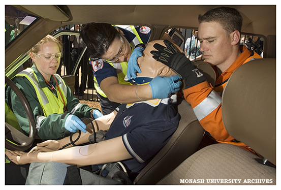Student Olivia Mackie-coop, Karen Zaleski (Seconded Officer) and Brad Cummins (SES) practise their skills at the RACV Trauma Simulation Complex at the Centre for Ambulance and Paramedic Studies.