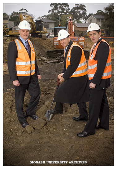 Professor Colin Chapman, dean of the Victorian College of Pharmacy (left) with the Minister for Innovation and State and Regional Development John Brumby (centre) turning the first sod at the site of building works at the Parkville campus