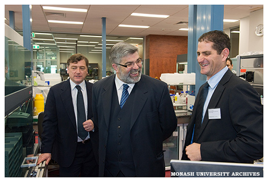 Alan Sawyer, Senator Kim Carr and Michael Spiegel touring the Monash Antibody Technologies Facility (MATF)
