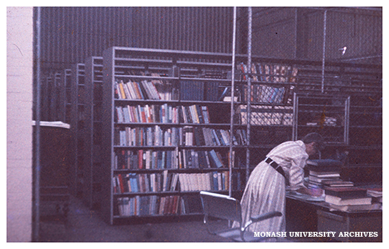 Kathleen Thomson working in the Monash Library in the Volkswagon factory