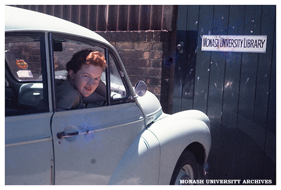 Anne Frazer outside the entrance to the Monash Library in the Volkswagon factory