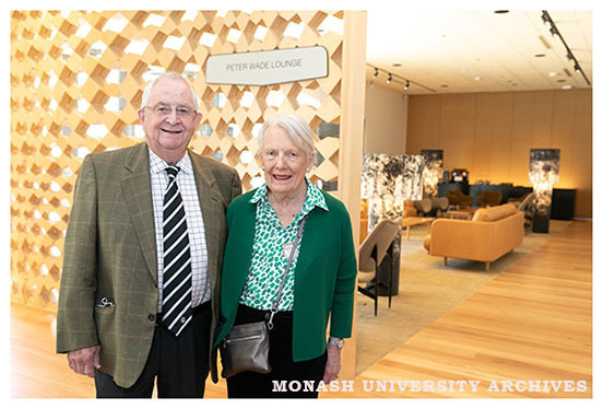 Former General Manager, Peter Wade, with wife Jan Wade outside the Peter Wade Lounge in the Chancellery Building, Clayton campus