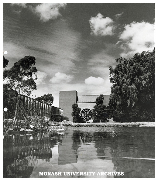 Looking over pond in forum towards Robert Blackwood Hall and University Offices