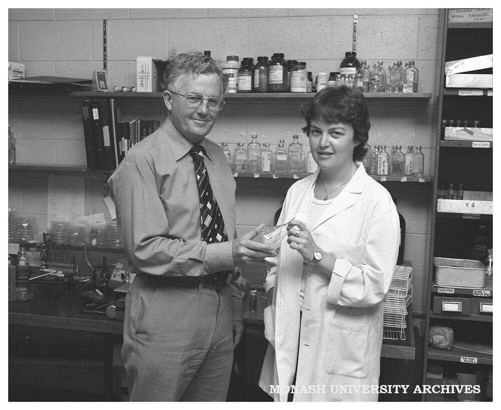Professor Bruce Holloway and research assistant Mandy Moore with bacterium sample