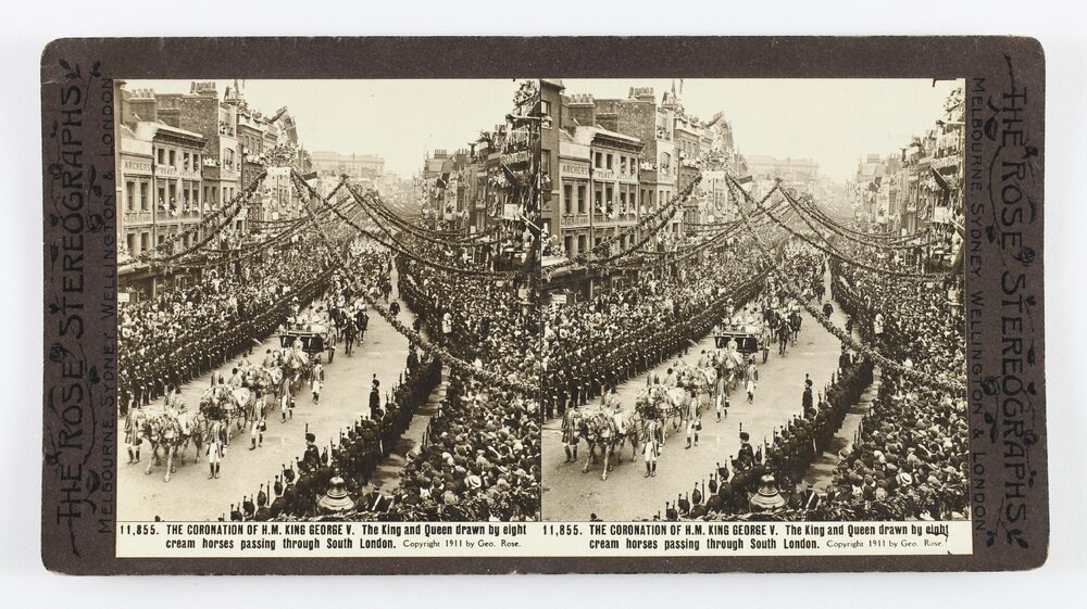 The Coronation of H.M. King George V. The King and Queen drawn by eight cream horses passing through South London