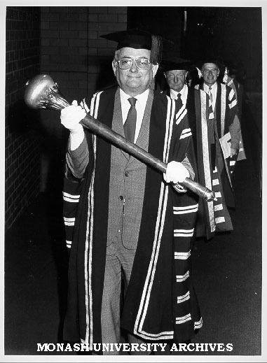 Academic procession led by mace-bearer
