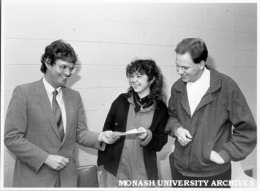Dean of Arts Professor John Hay presenting Carroll Prize to Sally Gilbertson (centre) and Cameron McLeod