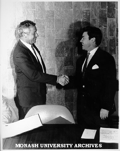 Dean of Medicine Professor Bob Porter (left) awarding Jubilee Research Prize to Dr Wayne Comper