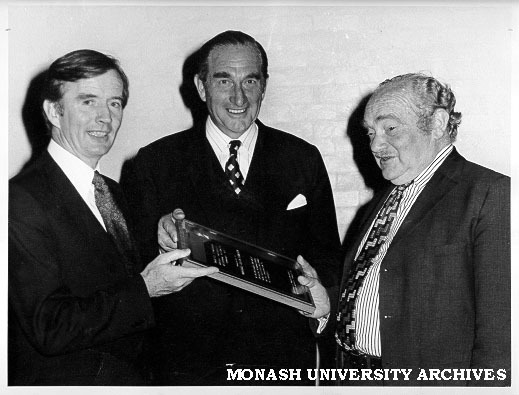 Presentation of plaque to Professor Joe Bornstein. CSL Director Dr N. McCarthy (left) and Chairman Mr Ross Shelmerdene (centre)