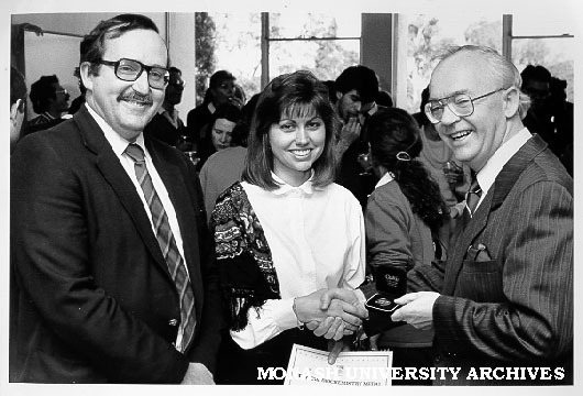 Presentation of inaugural Merck Biochemistry Medal to Meredith Ellis. Managing Director of BDH Chemicals Mr Allan Dewar (right), Professor Milton Hearn (left)