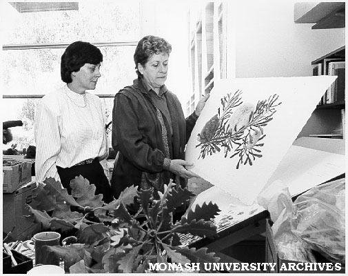 Senator Kay Patterson (left) and Celia Rosser with banksia watercolour
