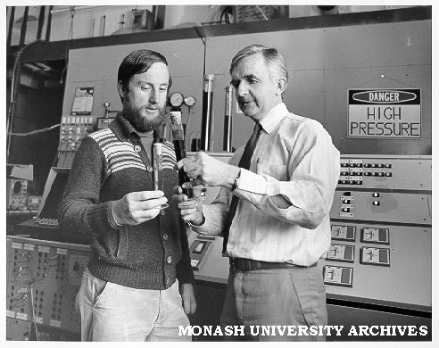 Associate Professor John Agnew (right) and student Donald Rogers examining synthetic crude