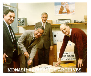 Vice-Chancellor Professor Ray Martin sealing first export model of square wave generator, with Mr Peter Wade (left), Professor Ron Brown and Mr Ron Beach