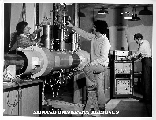 Professor Ron Brown (left), student John Storey and Dr Peter Godfrey adjusting apparatus in lab