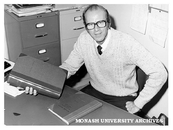 Dr David Collins with sample of book binding hobby