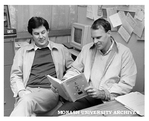 Dr Michael Taylor (right) and Dr Peter Newton (CSIRO) with their book 'Microcomputers for local government planning and management'