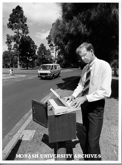 Dr Bill Young collecting data from traffic counter