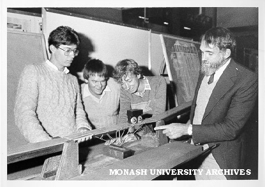 Winners of Primitive Primordial Pristine Cupreous Bridge Competition. Phillip Black (left), Marcus Leonard and Richard Green, with Professor Noel Murray