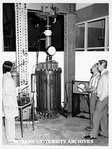 Dr Adikari (left), Dr Alan Parkin and Mr H. J. Puszka with triaxial and compression testing equipment