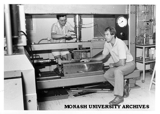 Dr Ian Johnston (front) and student Elio Novello with constant normal stiffness direct shear machine