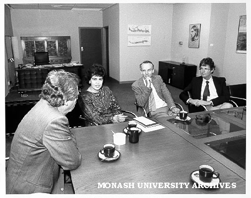 Professors Mal Logan (left), Alan Henry and John Hay with Mrs Maria Kouppas of Opal Male Fashions, member of Monash Friends of the Australian Institute of Archaeology in Athens