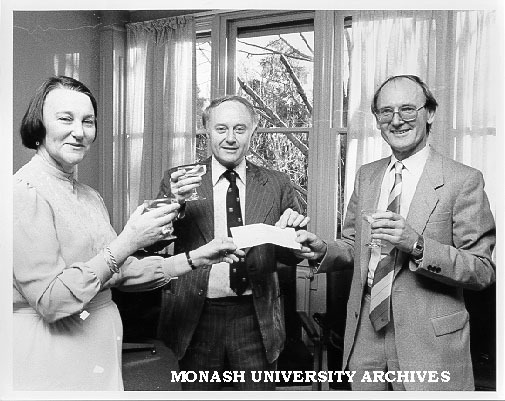 Mrs Frances Maber of Commonwealth Department of Education presenting cheque to Professors John Rickard (Melbourne University) and Peter FitzRoy (Monash), towards establishment of Foundation for Management Development