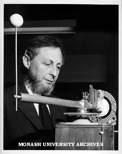 Professor Chris Wallace adjusting computerised 'juggler'