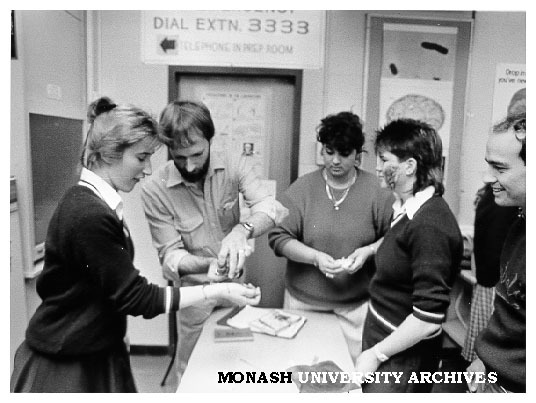Geoff White demonstrating first aid to students from Mordialloc High School