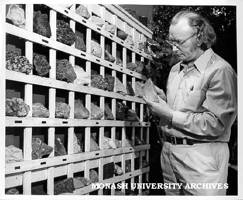 Senior technical officer, Karl Weber examining mineral specimens