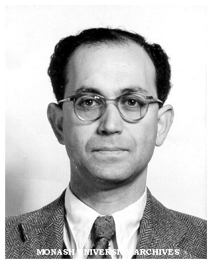 Professor J.E. Isaac, Chair of Economics