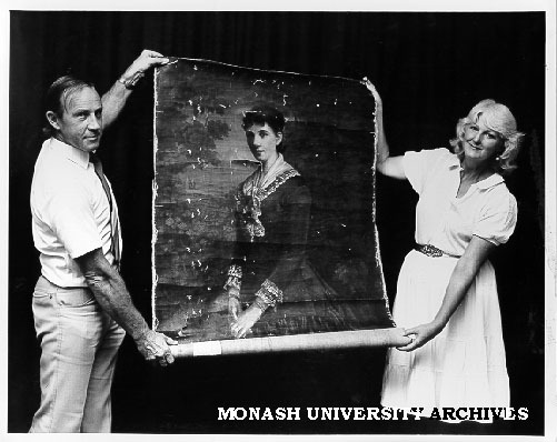 John Drury and Judith Armstrong with mystery portrait