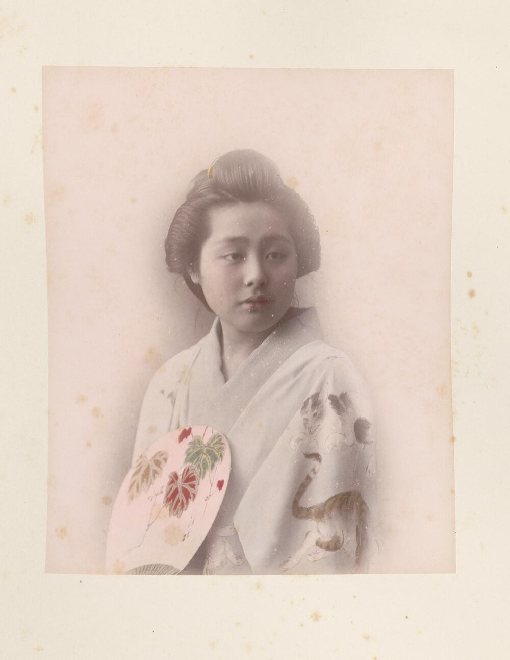 Portrait of a woman with a fan (identity unknown)